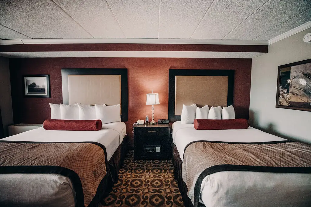 2 hotel beds nicely made